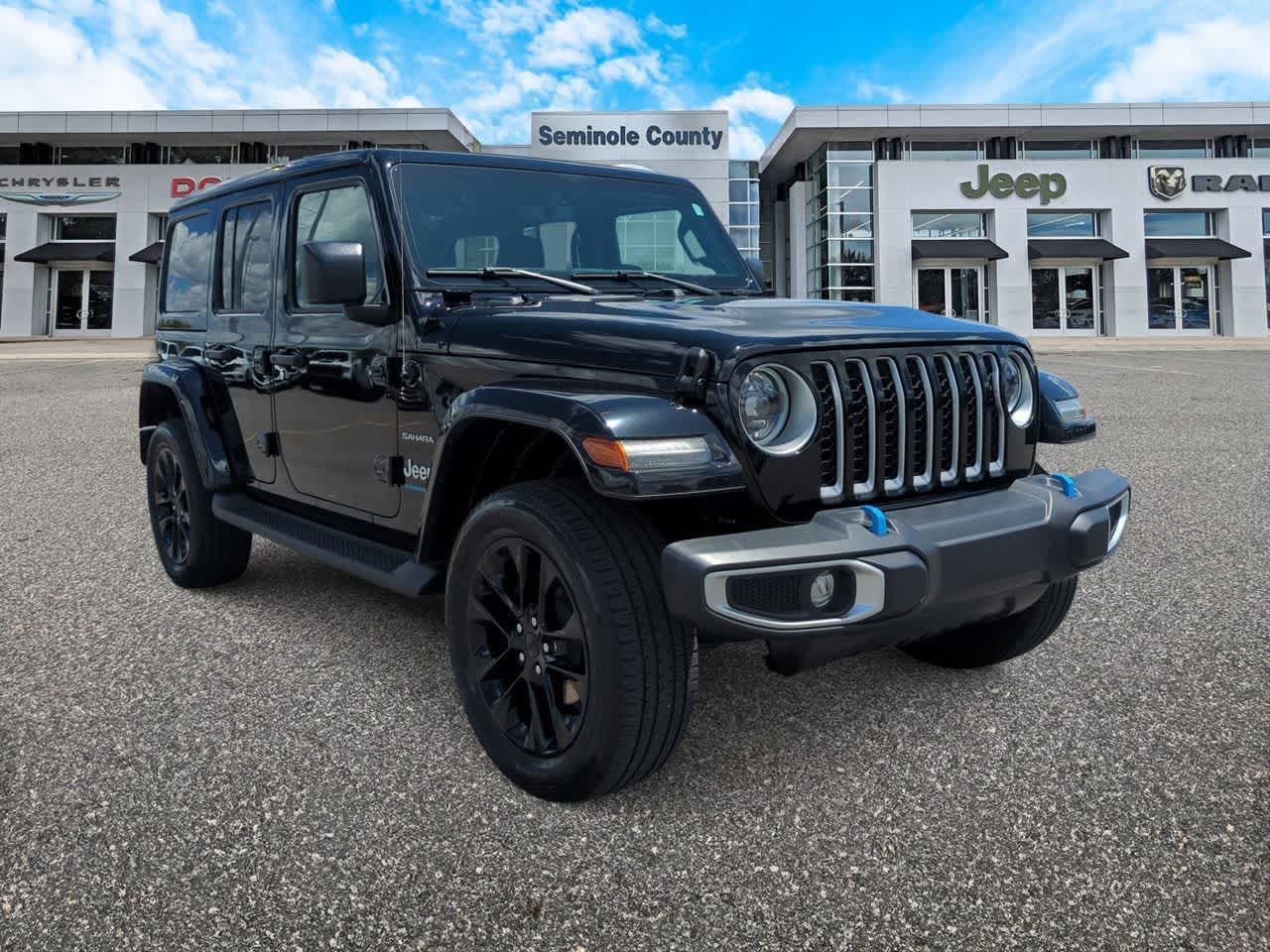 Used 2023 Jeep Wrangler 4xe Sahara 4XE with VIN 1C4JJXP64PW513943 for sale in Sanford, FL